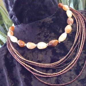 Elegant Multi-Strand Brown and Cream Necklace